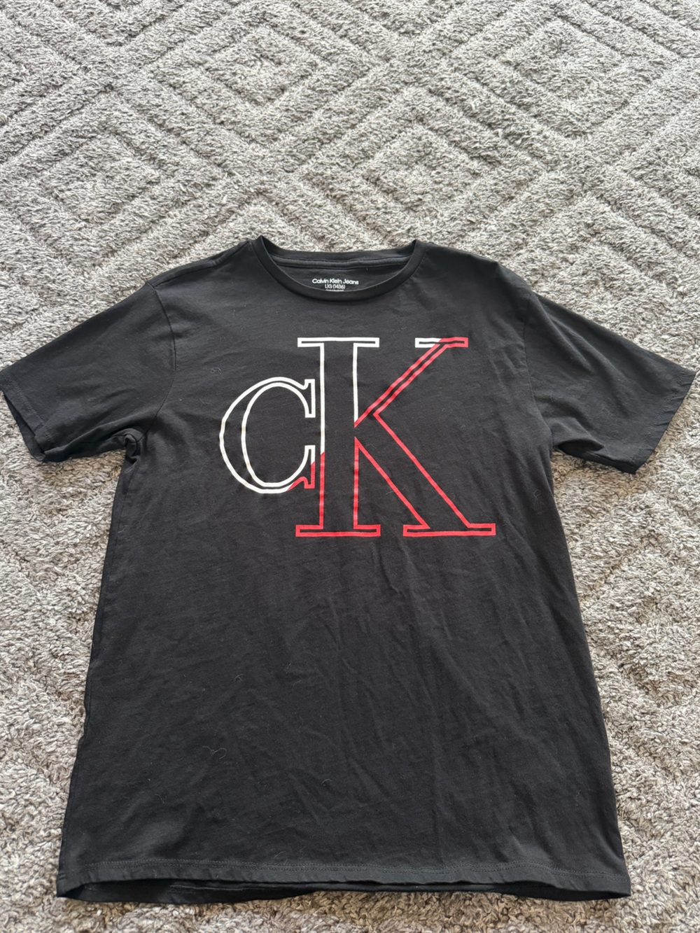 Calvin Klein Jeans Black Tee with Red & White CK Outline Logo